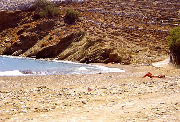 unorganized beach with one person