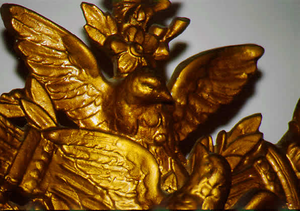 gold bird wood carving