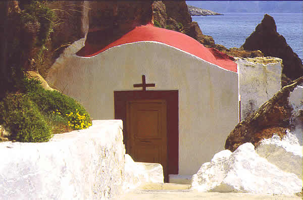chapel in rocks by sea shore