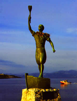 statue of man with torch